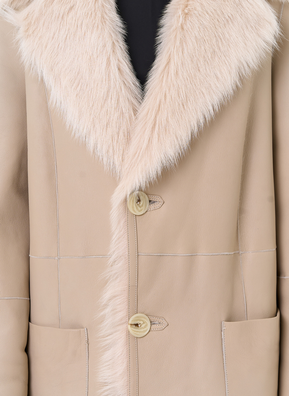 Женская двухсторонняя дубленка с поясом