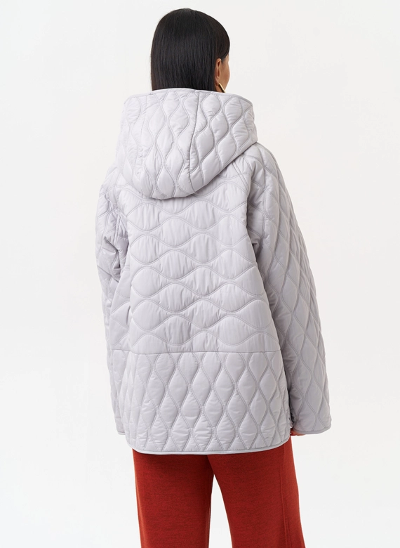 Женская стеганая куртка с капюшоном фото